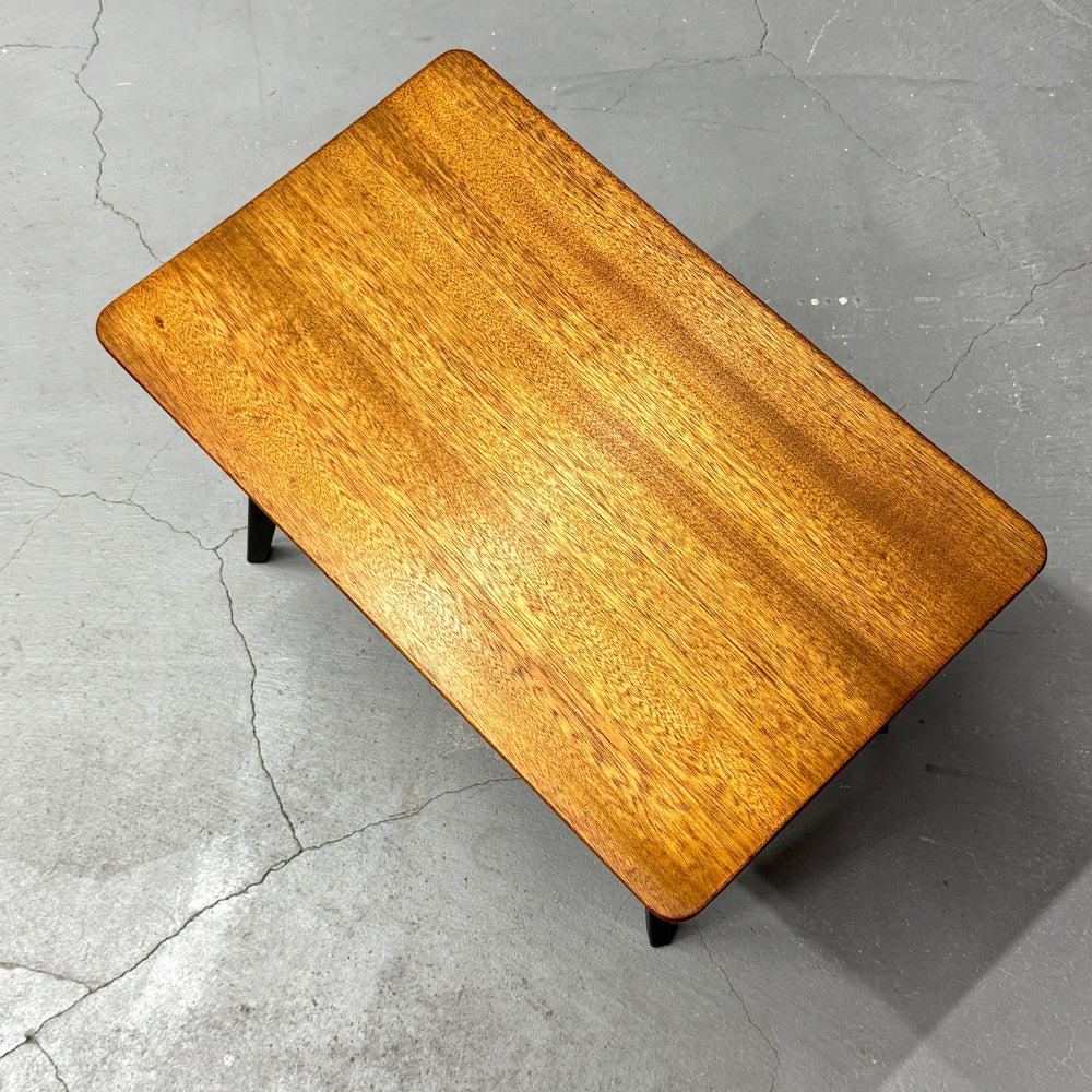 
                      
                        Coffee table with black legs
                      
                    