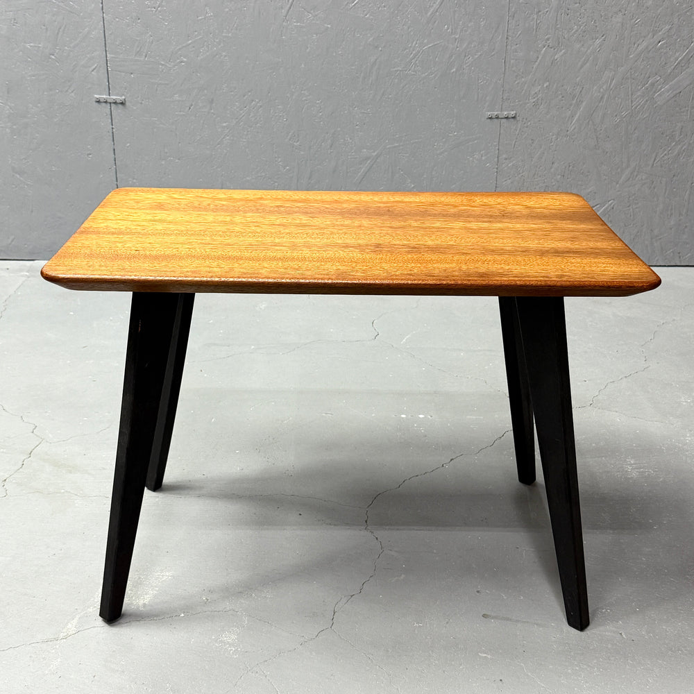 
                      
                        Coffee table with black legs
                      
                    