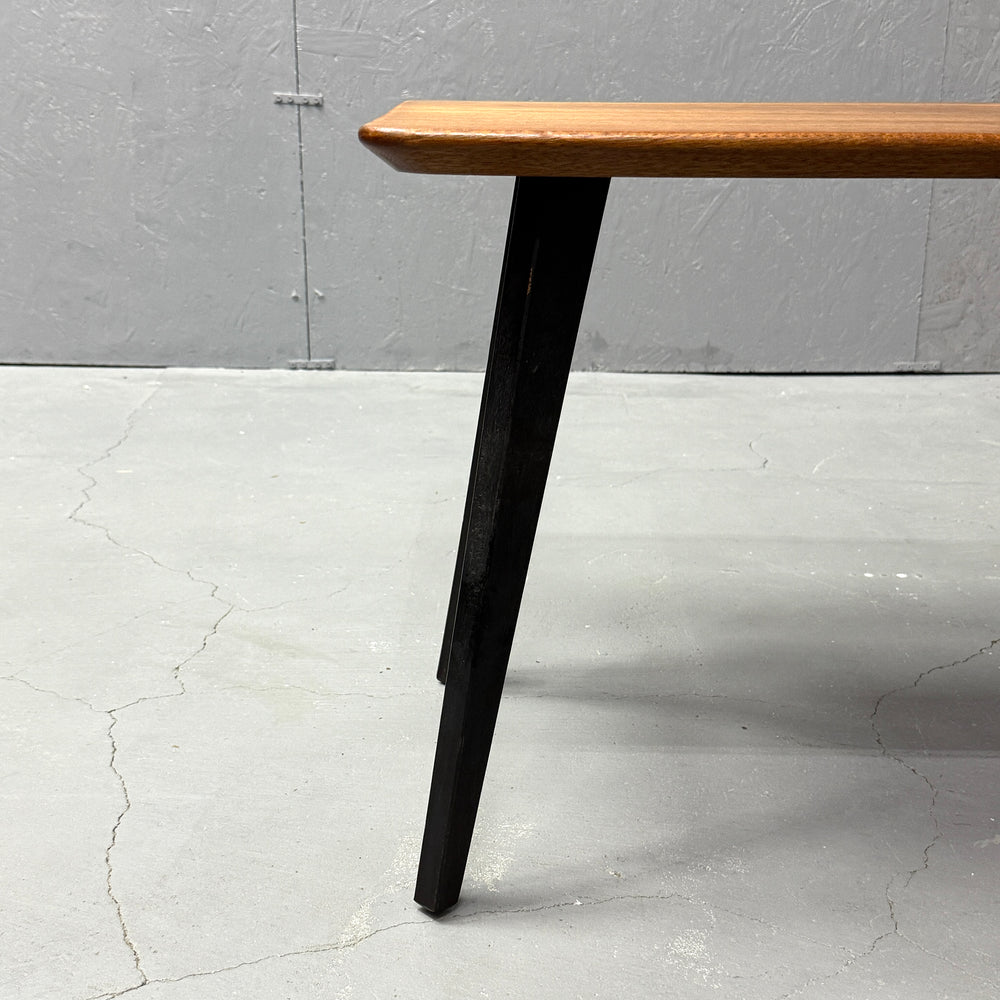 
                      
                        Coffee table with black legs
                      
                    