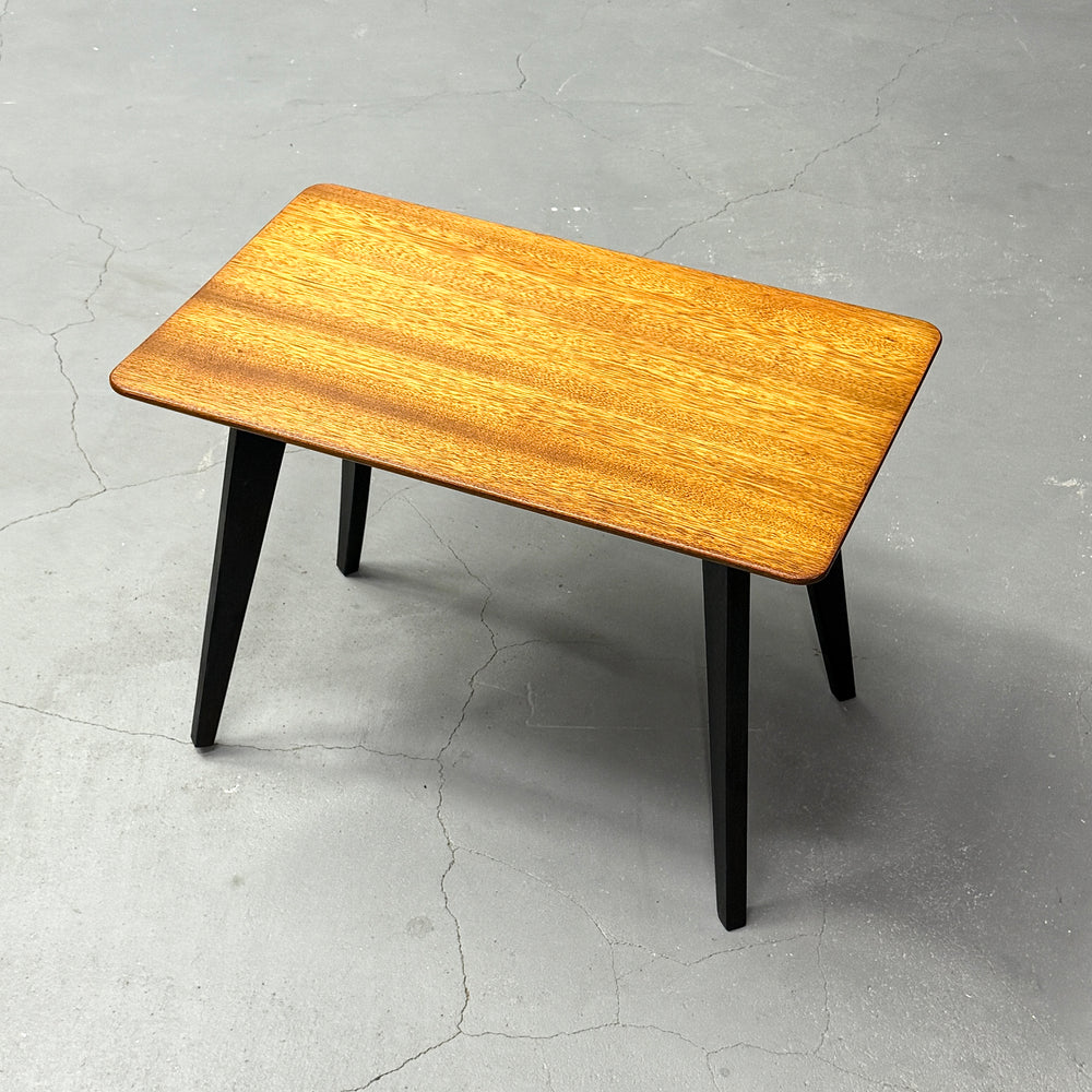 
                      
                        Coffee table with black legs
                      
                    