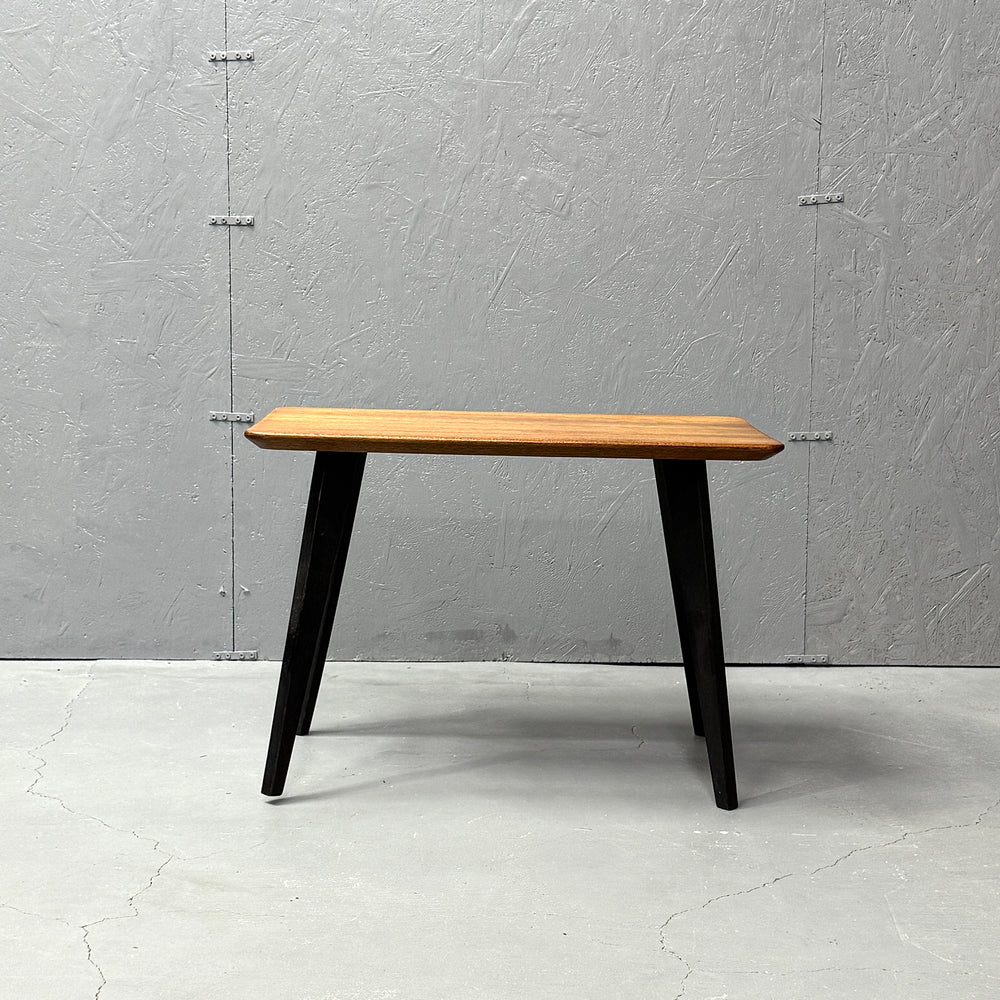 
                      
                        Coffee table with black legs
                      
                    