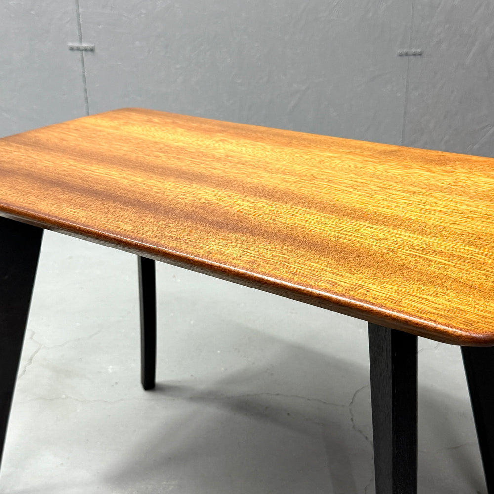 
                      
                        Coffee table with black legs
                      
                    