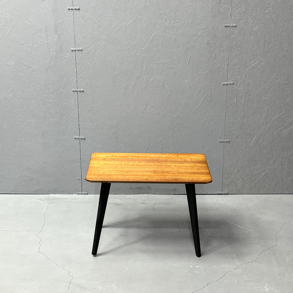 
                      
                        Coffee table with black legs
                      
                    