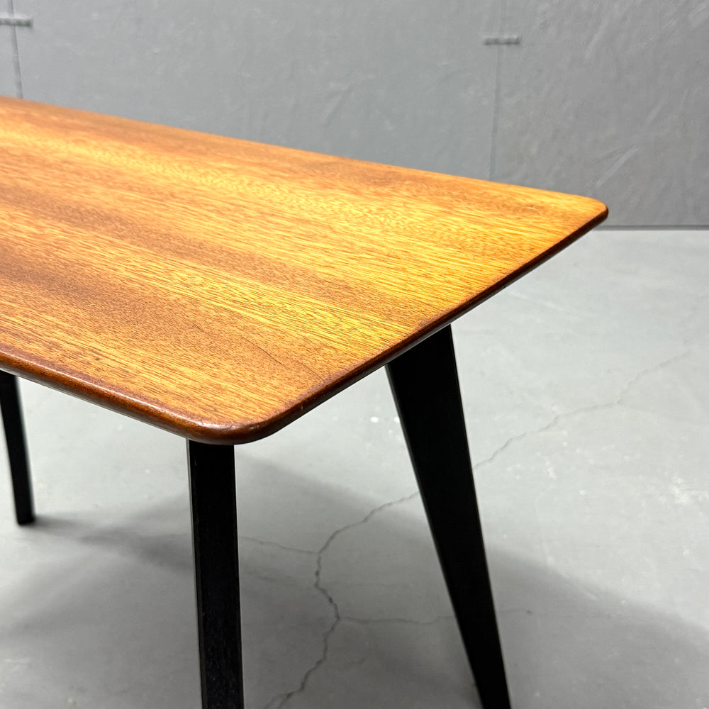 
                      
                        Coffee table with black legs
                      
                    