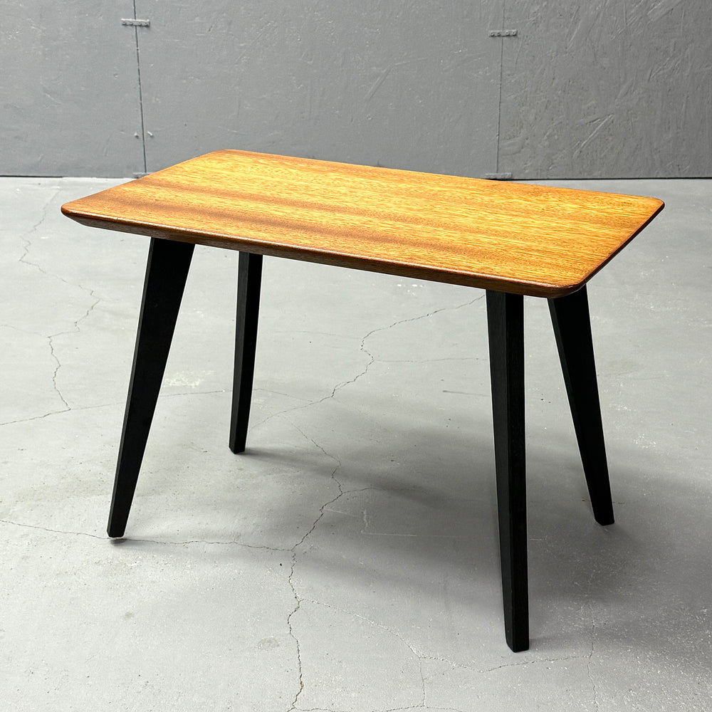 
                      
                        Coffee table with black legs
                      
                    